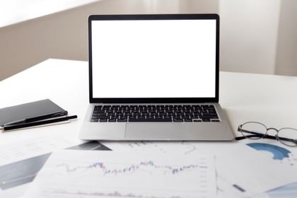Laptop and documents for a digital order